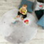 Round play mat with hot air balloon design in soft colors, durable and comfortable