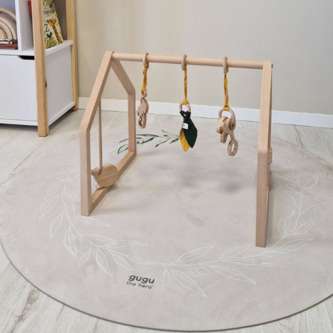 Rond speelkleed in beige met subtiele olijftakjes, duurzaam en comfortabel