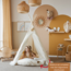 Boho tipi tent with tulle and fairy accents in ecru – a dreamy play spot for kids