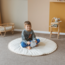 Round play mat with decorative pompons – Ecru | Soft and cozy