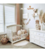 Speelkleed in boho stijl met kwastjes in ecru – zacht, stijlvol en perfect voor de babykamer