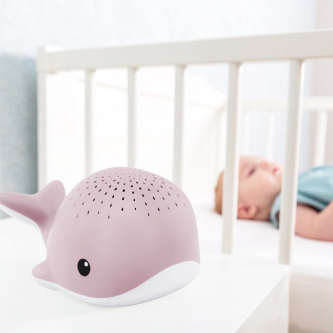 Beruhigender Projektor in Walform für Kinder in sanftem Rosaton