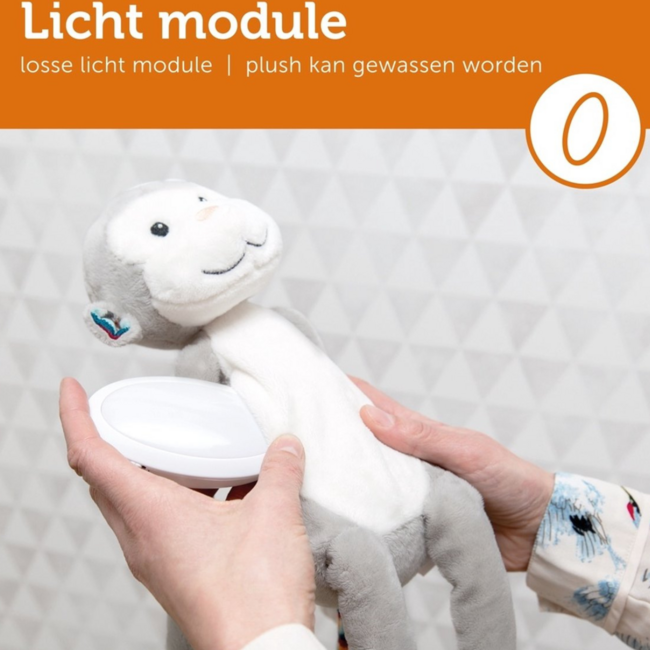 Singe doux en peluche avec veilleuse apaisante et berceuses