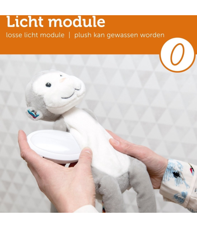 Zachte knuffelaap met rustgevend nachtlampje en slaapliedjes