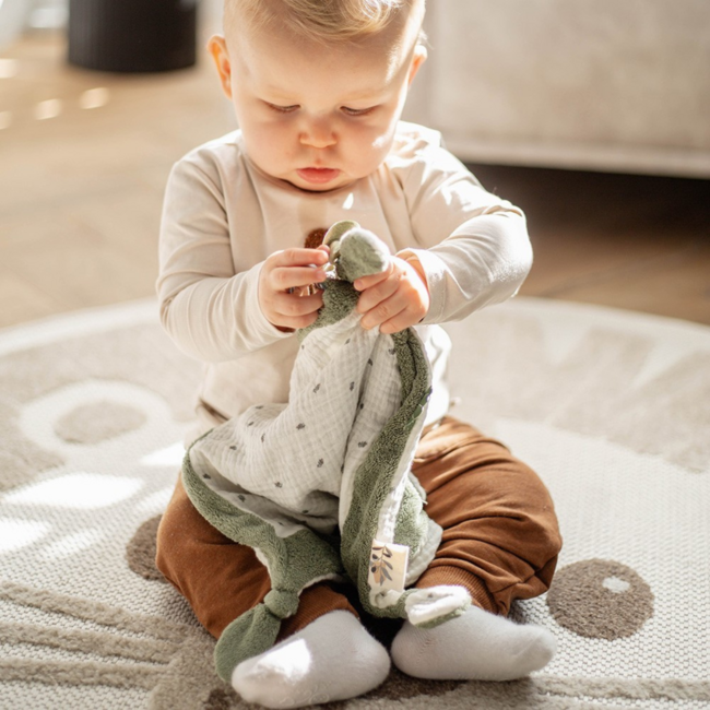 Soft comfort blanket in olive green for babies, perfect for comfort and security