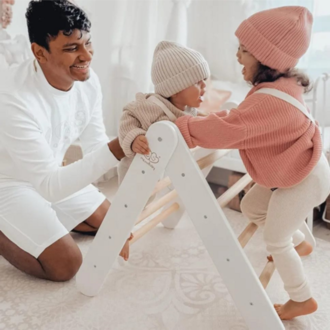 Climbing frame with tent cover in white and blue – versatile play furniture for kids