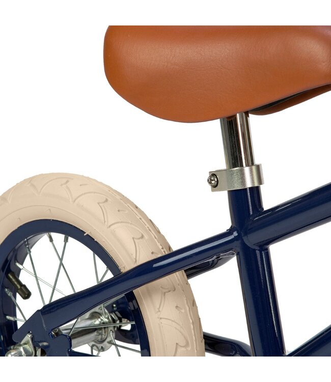 Blauwe 12 inch loopfiets met verstelbaar stuur en rieten mand