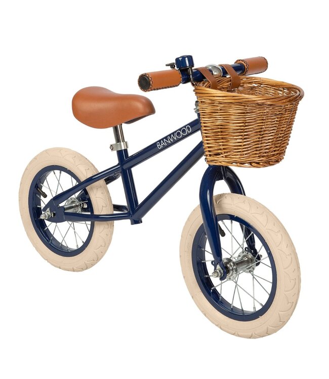 Blauwe 12 inch loopfiets met verstelbaar stuur en rieten mand