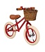 Rode 12 inch loopfiets met verstelbaar stuur en rieten mandje