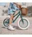 Groene 12 inch loopfiets met verstelbaar zadel en rieten mand