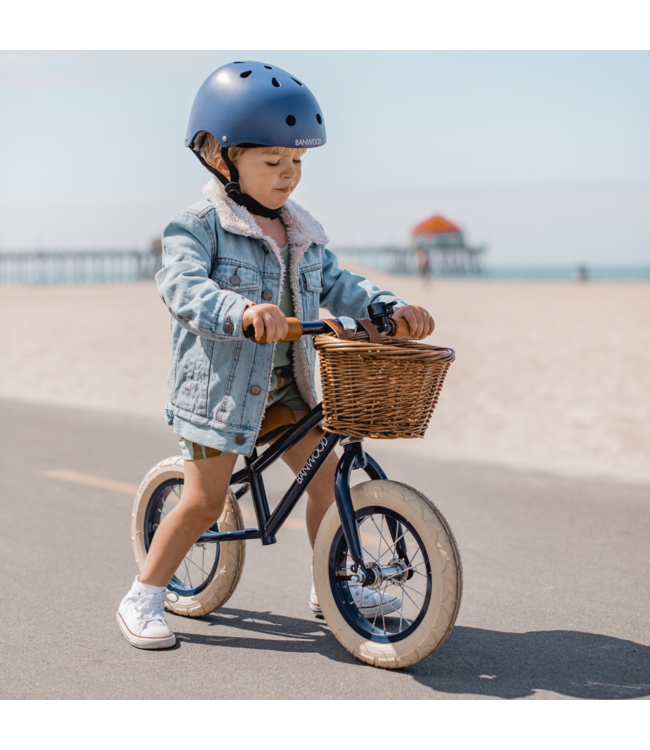 Blauwe 12 inch loopfiets met verstelbaar stuur en rieten mand