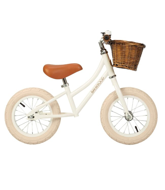 Witte 12 inch loopfiets met verstelbaar stuur en rieten mandje