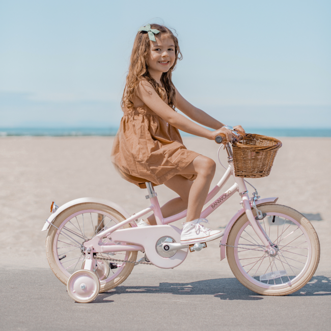 Kinderfiets 16 inch roze met mand, zijwieltjes en verstelbaar stuur