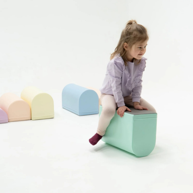 Foam blocks obstacle course in soft pastel colors – safe and motor skills boosting
