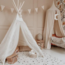 Boho tipi tent with tulle and fairy accents in ecru – a dreamy play spot for kids
