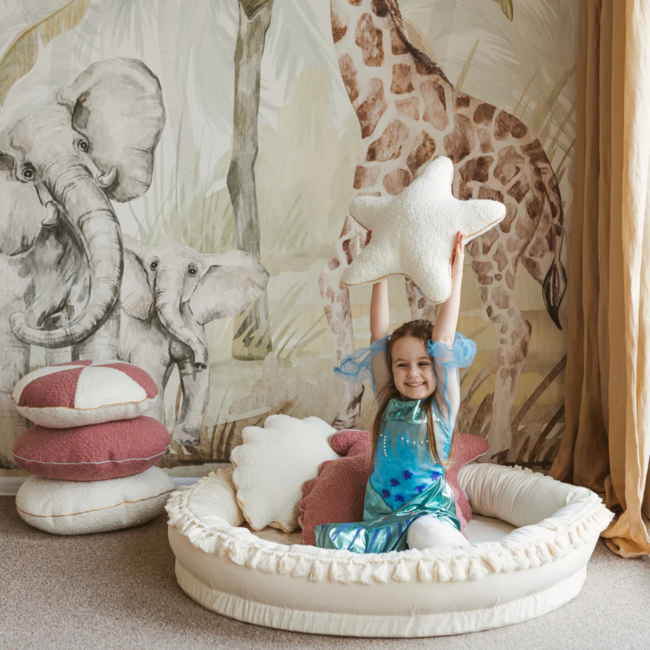 Rond speelnest met zachte opstaande randen en decoratieve kwastjes