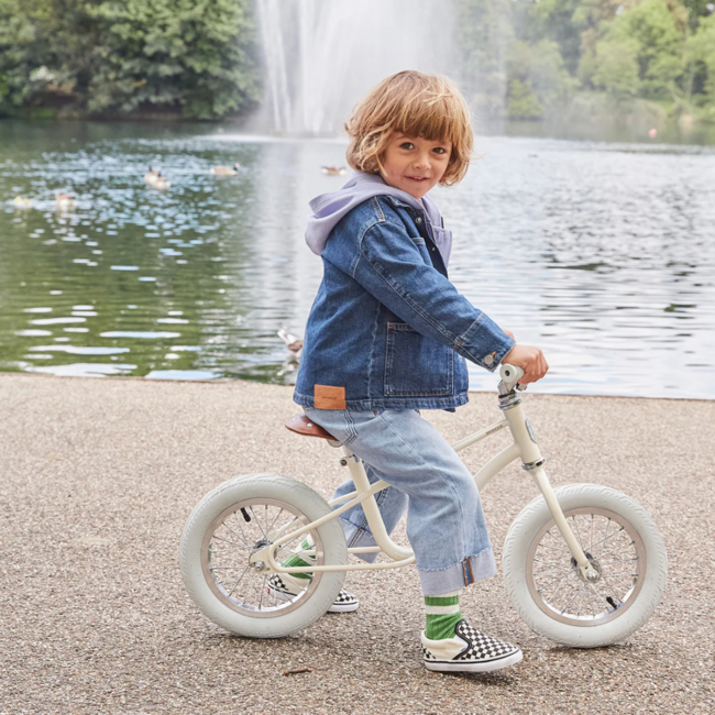 Stylish balance bike icon 12 inch in cream – perfect for little explorers