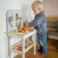Durable wooden workbenches for imaginative play and fine motor development