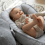 Baby nest made of corduroy fabric in grey – soft and cozy for your little one