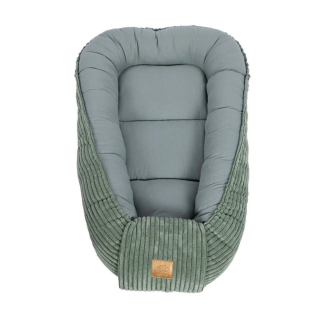 Baby nest made of corduroy fabric in green – soft and cozy for your little one