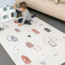 Tapis de jeu rectangulaire avec motif Scandi Town pour un jeu sûr et confortable