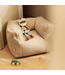 Kinderfauteuil van zachte teddy stof in warme zandkleur