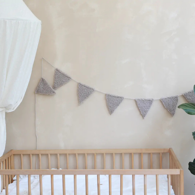 Handmade bunting banner made of teddy fabric in taupe – warm and soft decoration for the kids’ room