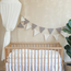 Handmade bunting banner made of teddy fabric in taupe – warm and soft decoration for the kids’ room