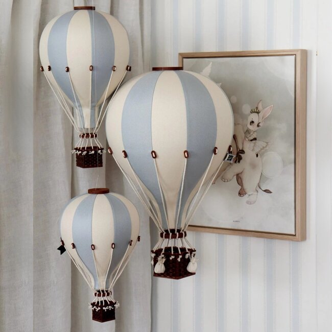Decorative hot air balloon in cream and mint tones for a charming interior