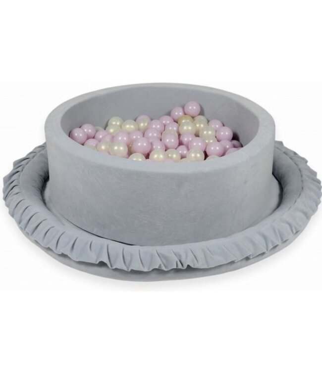 Grijs velvet speelnest met hoge zachte randen – stijlvol en veilig