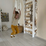 Compact wooden wall rack and mini climbing frame in natural and white