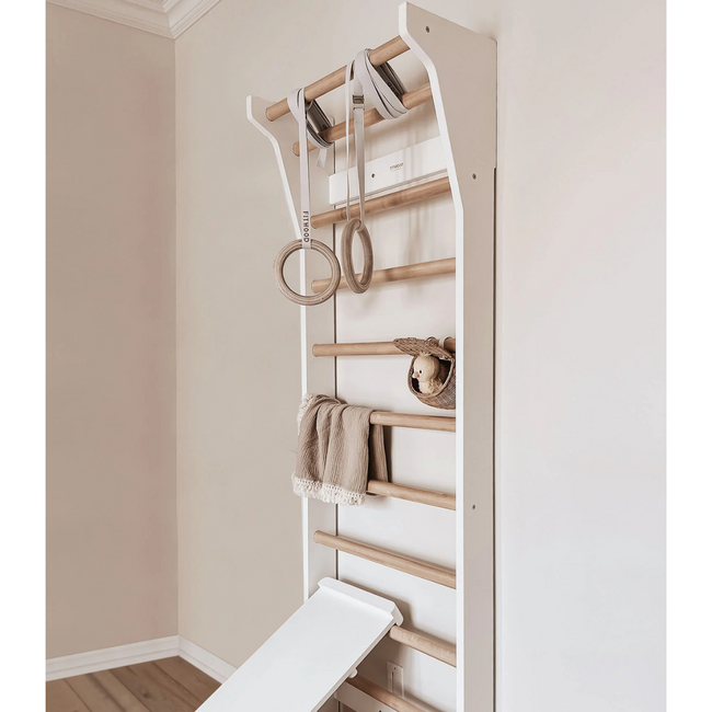 Compact wooden wall rack and mini climbing frame in natural and white