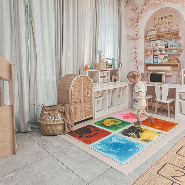 Sensory and colorful floor tiles to encourage motor skills, color recognition, and imaginative play