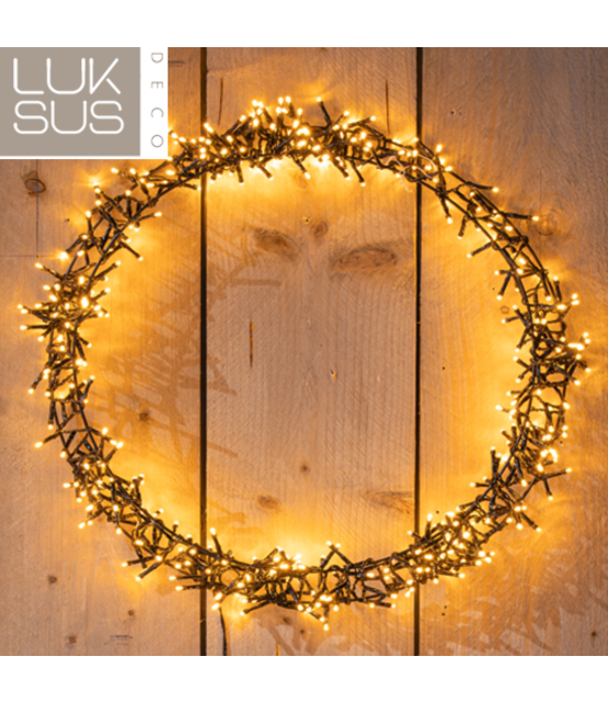 Verlichte kerstkrans ring 58 cm met 500 led lampjes warm wit - maat M