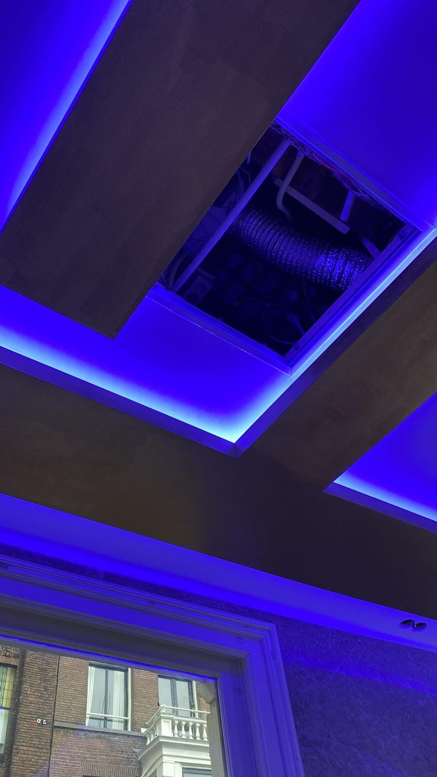 Koof verlichting met LED profielen en RGBCCT LED strips te Amsterdam