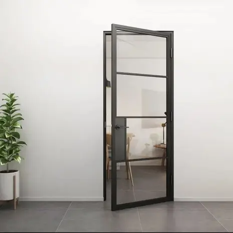 Loftdeur Stalen scharnierdeur helder glas met zwarte deurklink