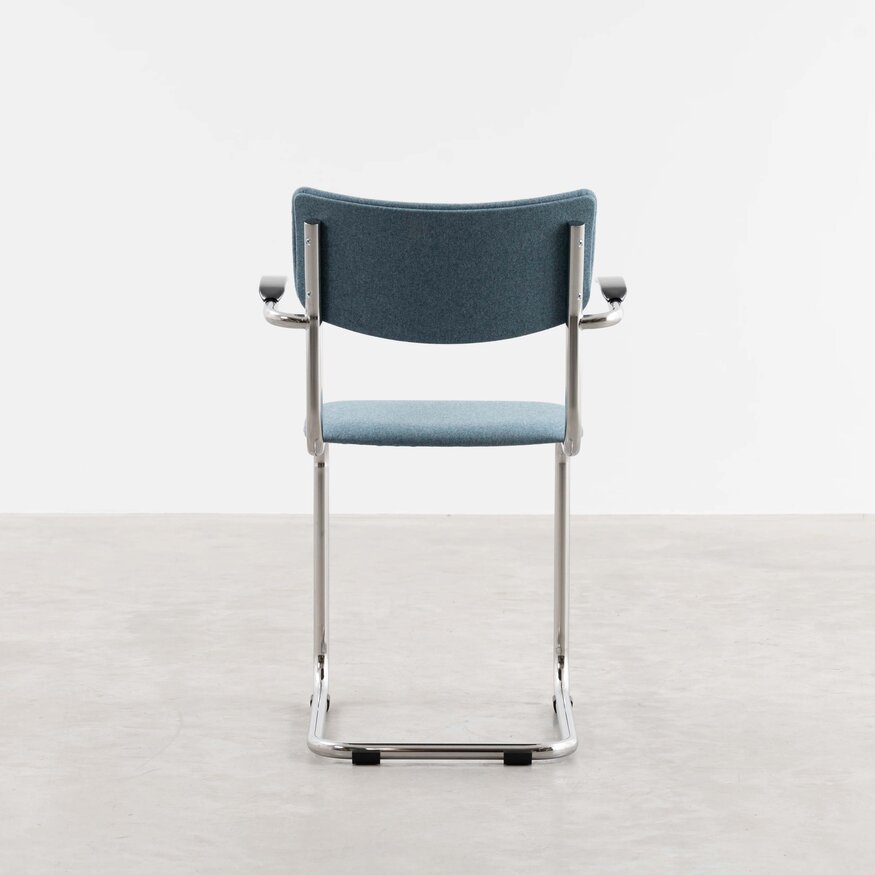 Dykmeyer De Purmer tubular frame Dining chair