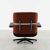 Vitra Eames Lounge Chair kersen en zwart leer Vitra
