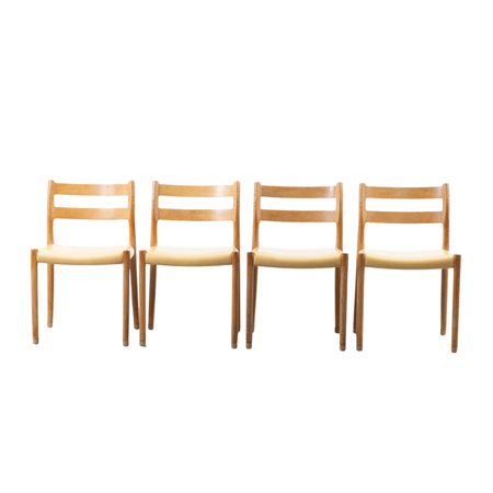 Set of 4 Niels Otto Moller Model 84 chairs upholstered in oak