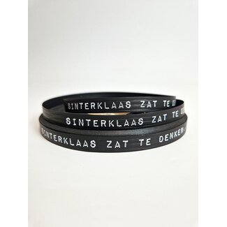 Der Nikolaus saß da und dachte nach – Geschenkband Schwarz/Weiß