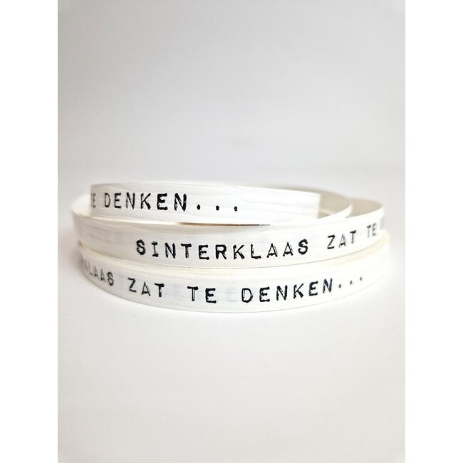 Sinterklaas dachte an ein geschenkband weiß/schwarz