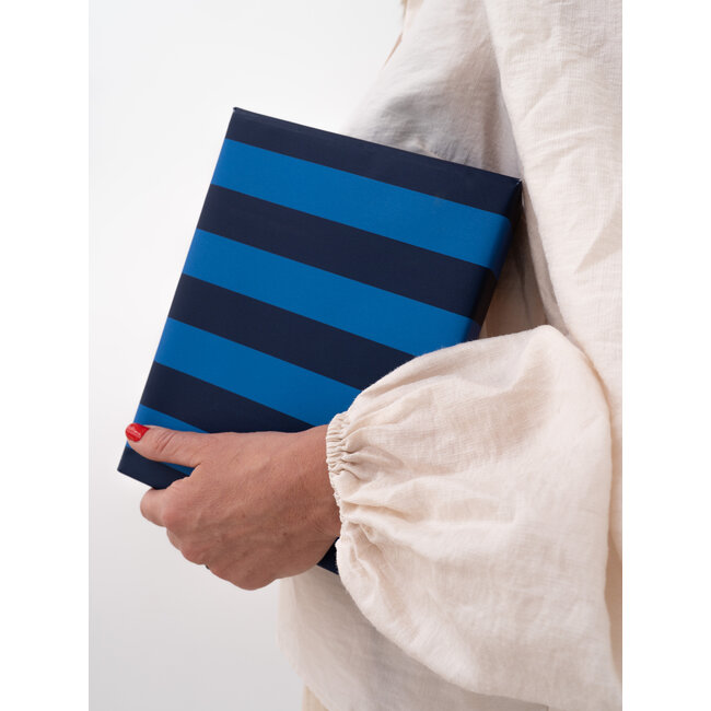 Gestreiftes blau/goldenes geschenkpapier