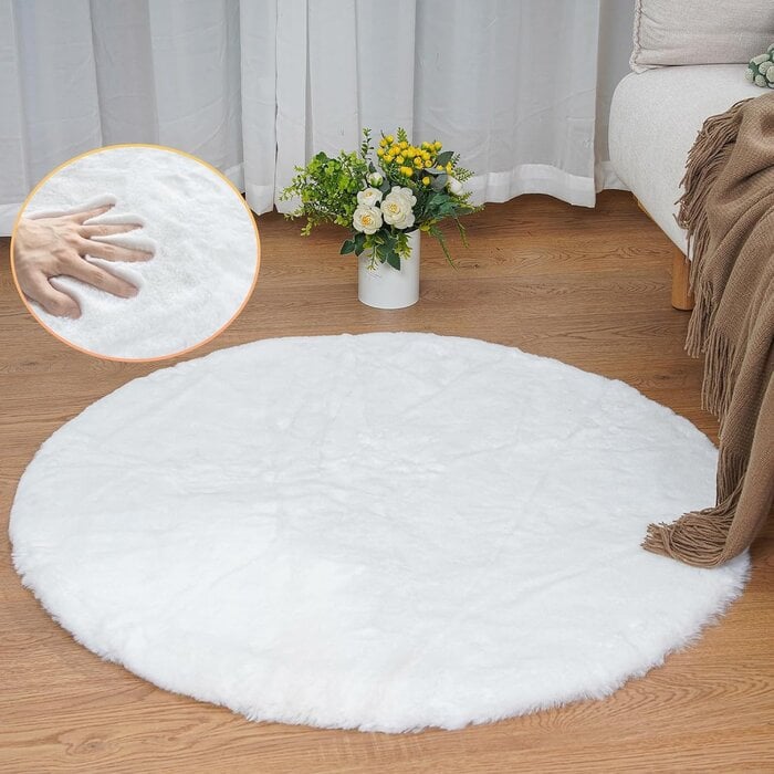 Tapis organique imitation fourrure noir 120x180cm - Jusqu'à 40% de remise