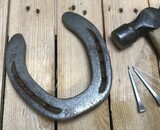 Comment accrocher un fer à cheval pour porter chance ?