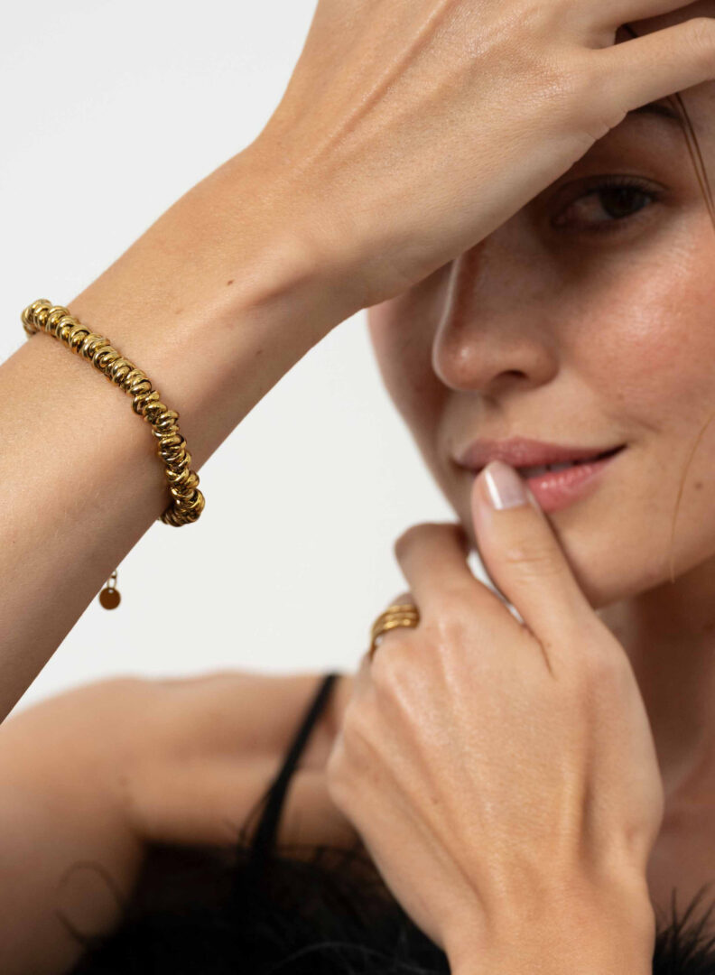 Armband met vergulde schakels