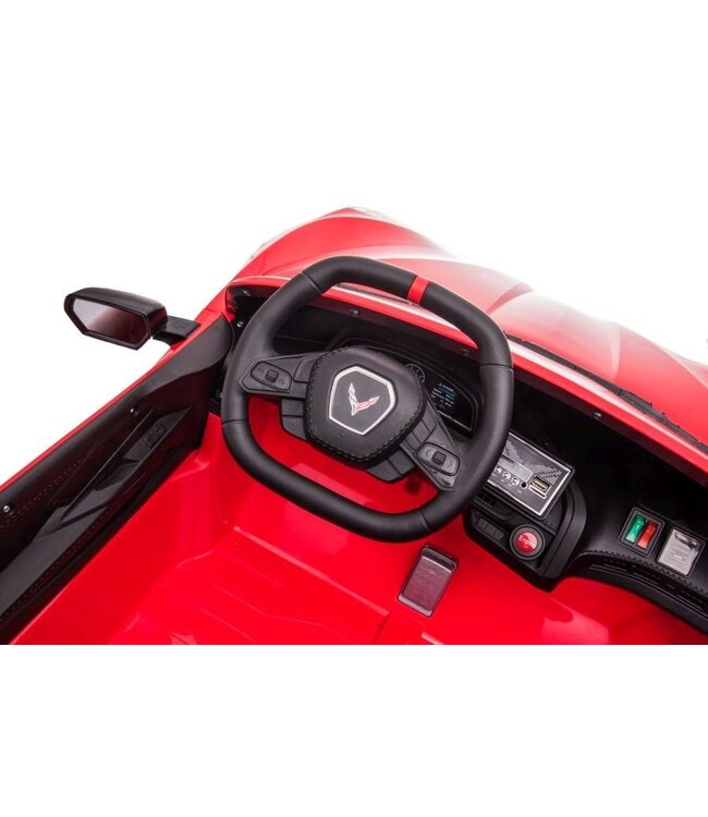 Corvette Stingray, an infant electric vehicle with 2 persons, 12 volts with the goma, as well as the customer!