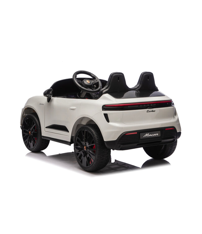 Porsche Macan Turbo, coche eléctrico para niños con batería de litio, módulo de música, neumáticos de goma y mucho más.