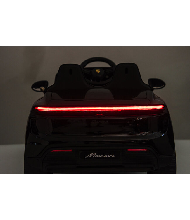 Porsche Macan Turbo, coche eléctrico para niños con batería de litio, módulo de música, neumáticos de goma y mucho más.