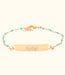 Stijlvolle turquoise dots armband met een gepersonaliseerd graveerplaatje