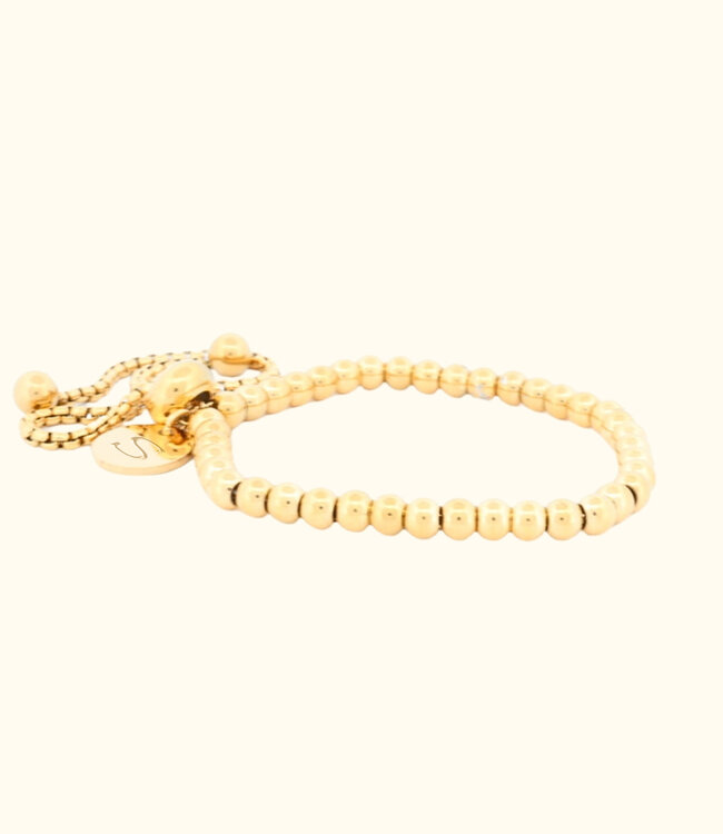 Flexibele Armband van bolletjes met gegraveerde letter bedel